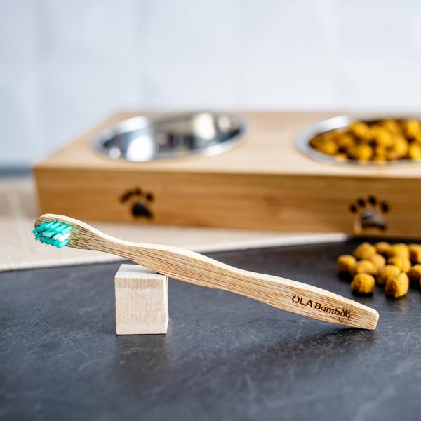 The OLA Bamboo toothbrush for dogs is an eco-friendly choice that’s also a good choice for your pet’s dental health, sold at Replenish General Store. 