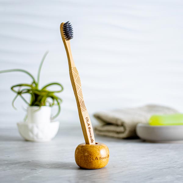 Biodegradable, sustainable, bamboo toothbrush holder available at Replenish General Store. 