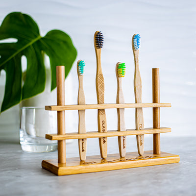 Bamboo, sustainable, biodegradable, toothbrush holder for 4 toothbrushes available at Replenish General Store. 
